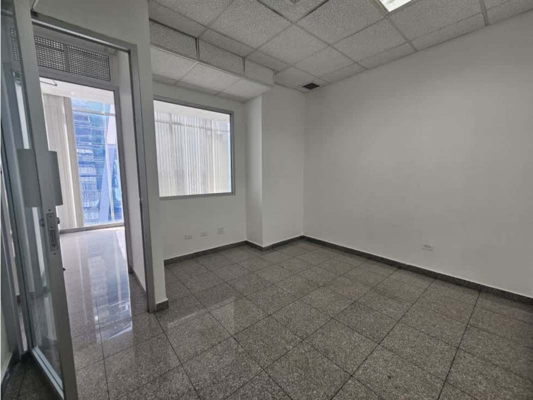 Empty divided office areas with glass doors at Torre Global Bank Business Tower Panama City