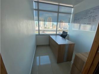 Office room with large window and city view in Plaza Korintho Panama City