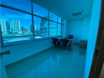 Modern office area with large panoramic windows at Plaza Korintho Panama City