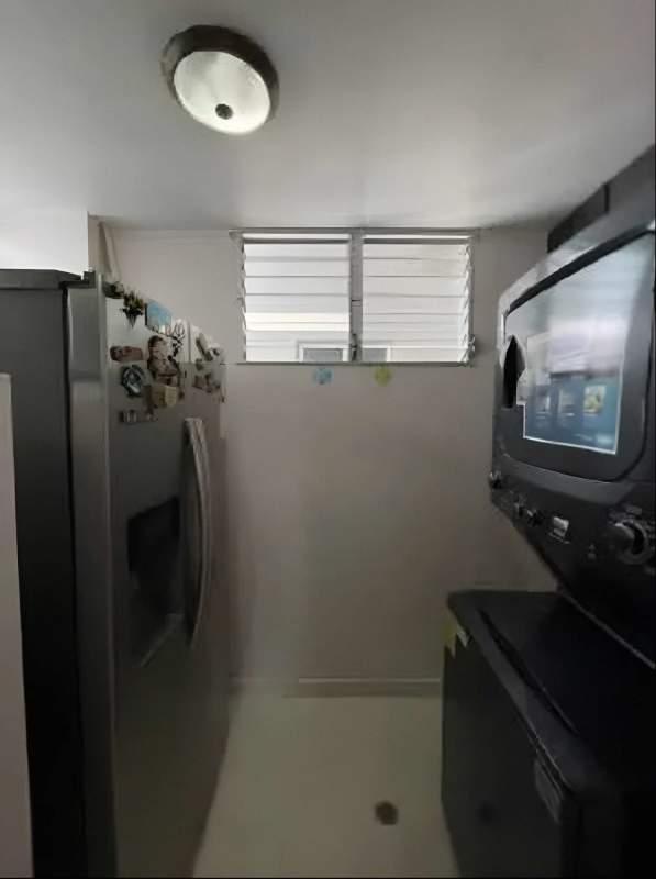 Bedroom featuring built-in closet, ceiling fan and bright light at PH Villa de las Fuentes Panama City