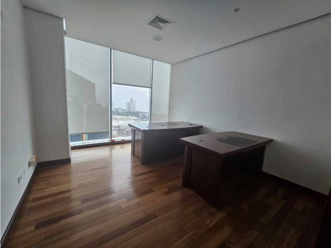 Interior workspace with desks and city views in PH Global Bank Tower Panama City Financial District