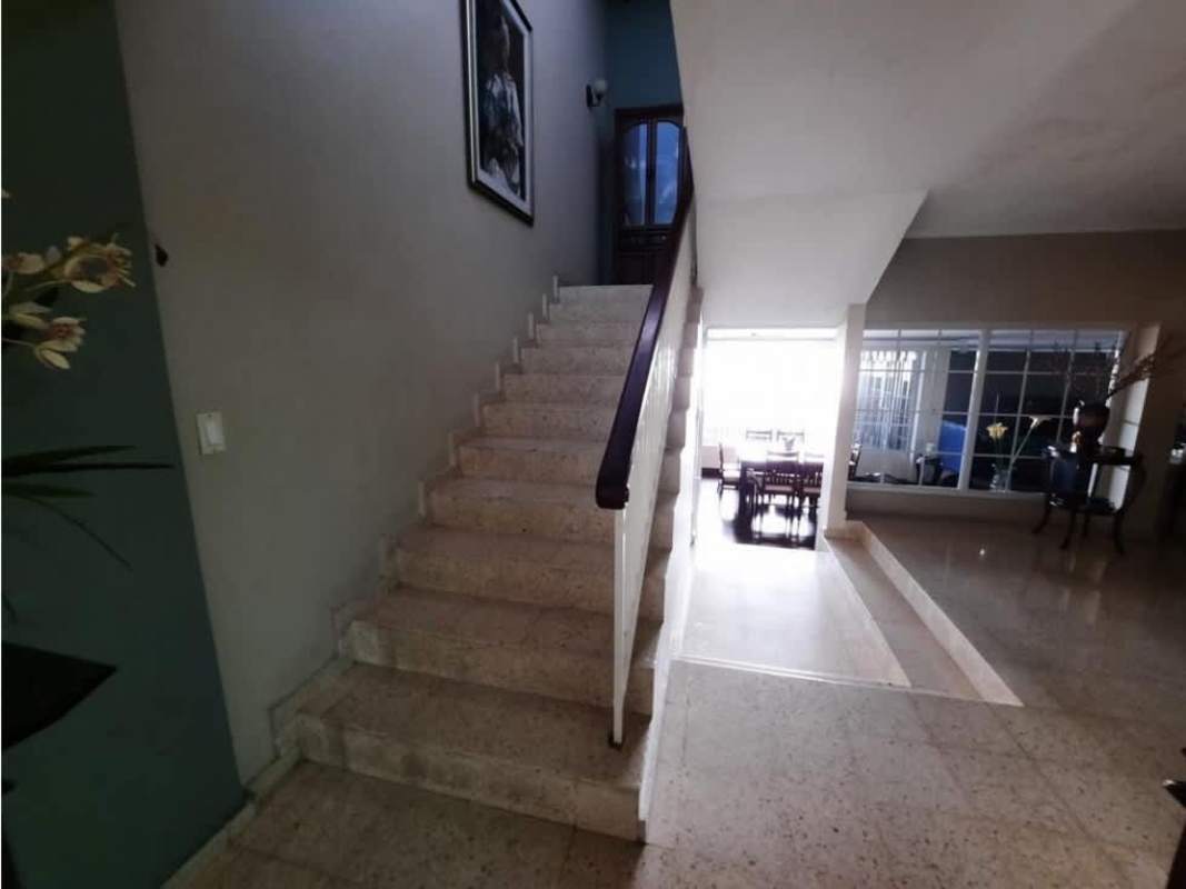 Bathroom with tile walls, vanity mirror cabinet, and fixtures La Alameda Panama