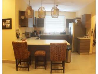 Bright bedroom with built-in closets Casamar Resort beach house Panama