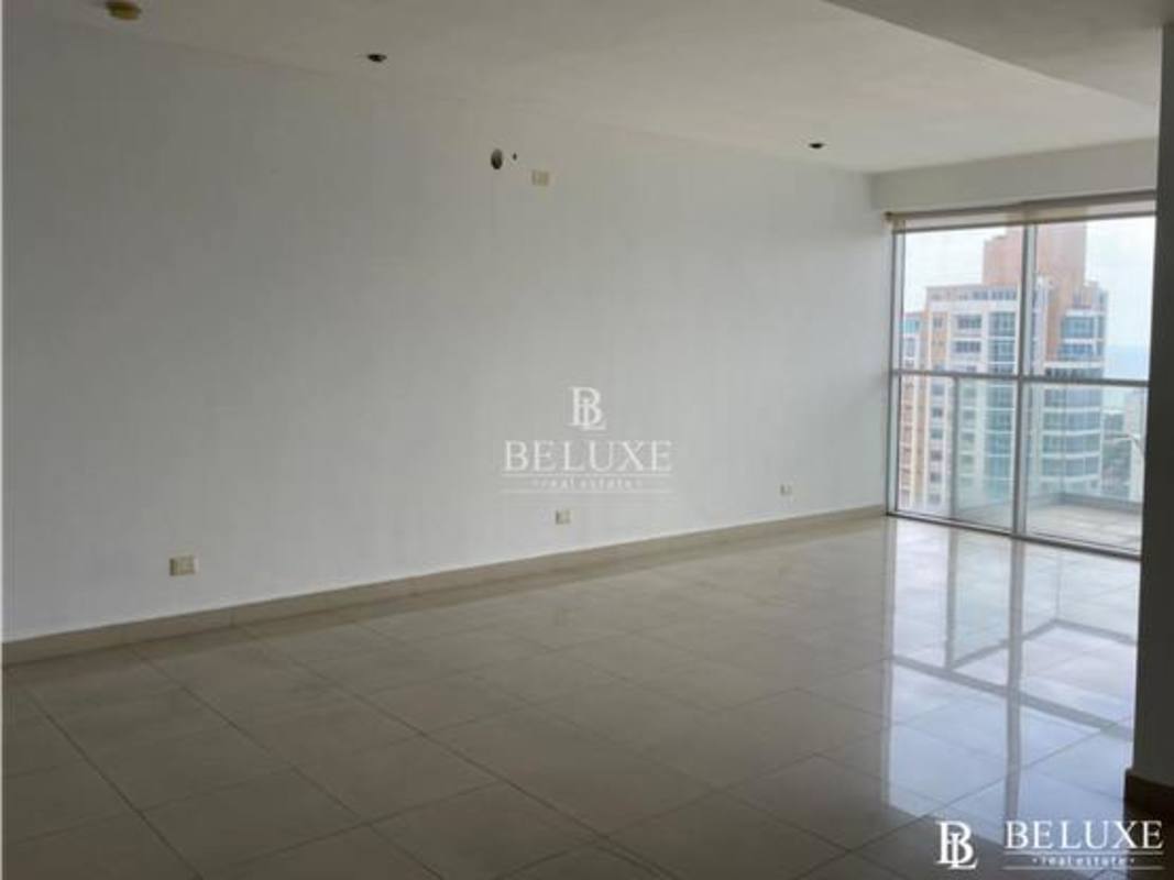 Multipurpose social lounge with natural light and city skyline view at PH Window Tower