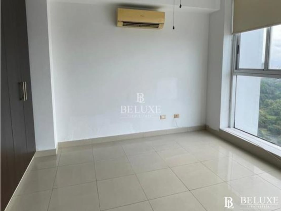 Bright master bedroom with city views in PH Window Tower San Francisco Panama