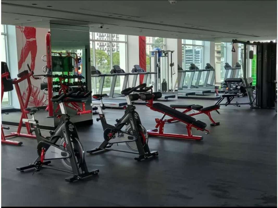 Rooftop infinity pool overlooking ocean and Panama City skyline at PH Costanera Bella Vista Panama
