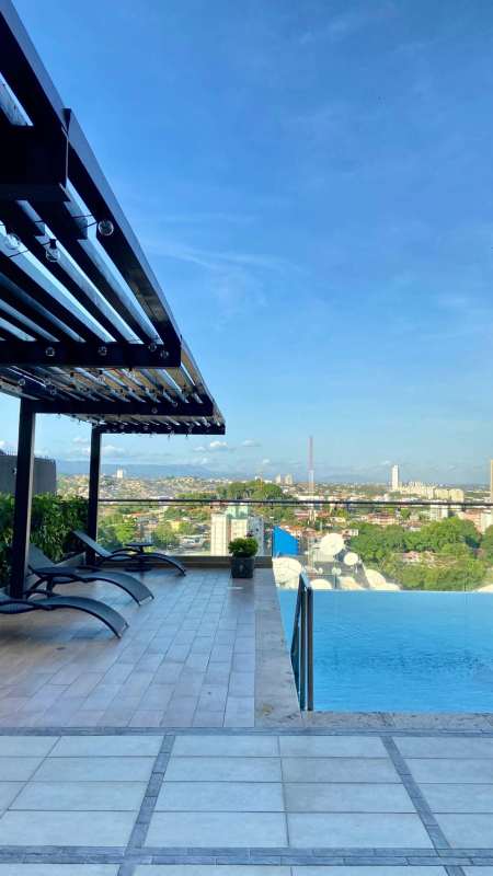 Fully equipped fitness center with city views at PH Victoria Royale Panama City