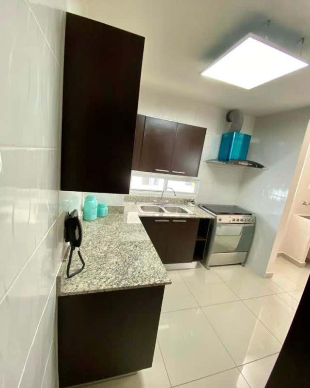 Modern living dining space with large balcony city view at PH Victoria Royale Panama