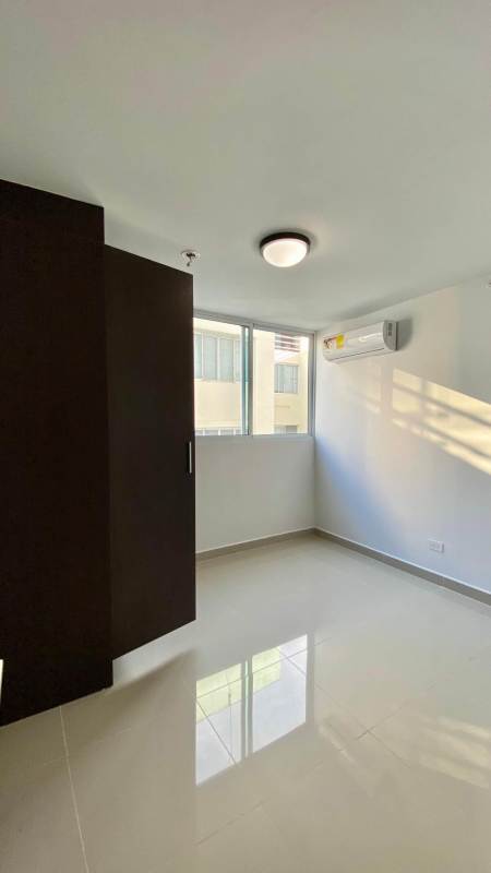 Bedroom with split AC window and built-in closet PH Victoria Royale Hato Pintado