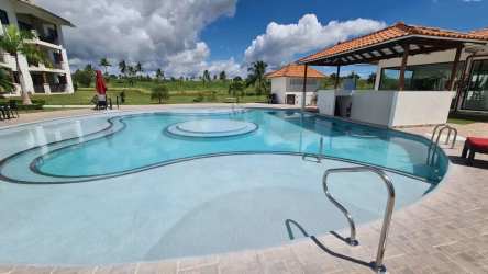 Swimming pool palm trees lounge chairs PH Vista Marina Resort San Carlos Panama