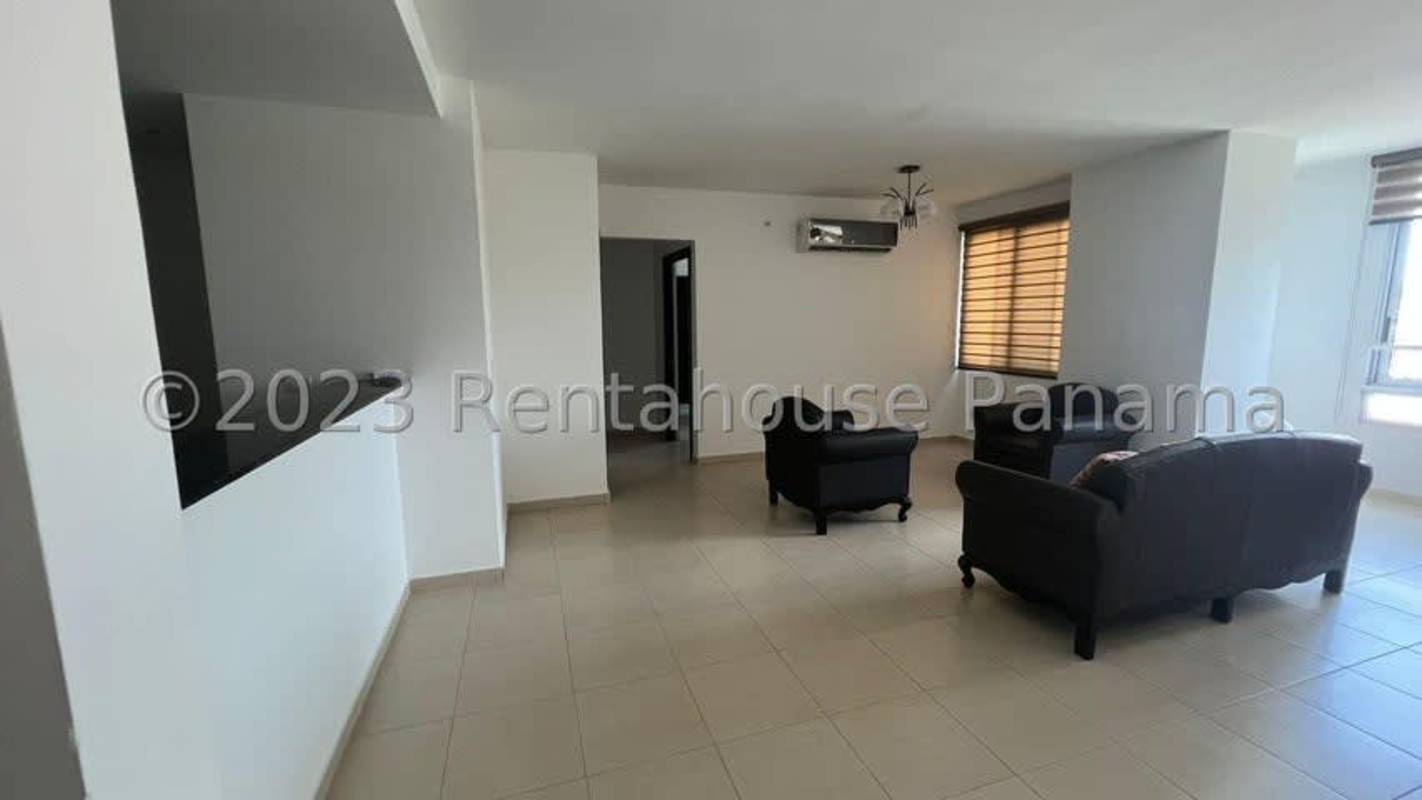 Living room with large windows and ceramic flooring in PH Vista Verde Betania Panama City