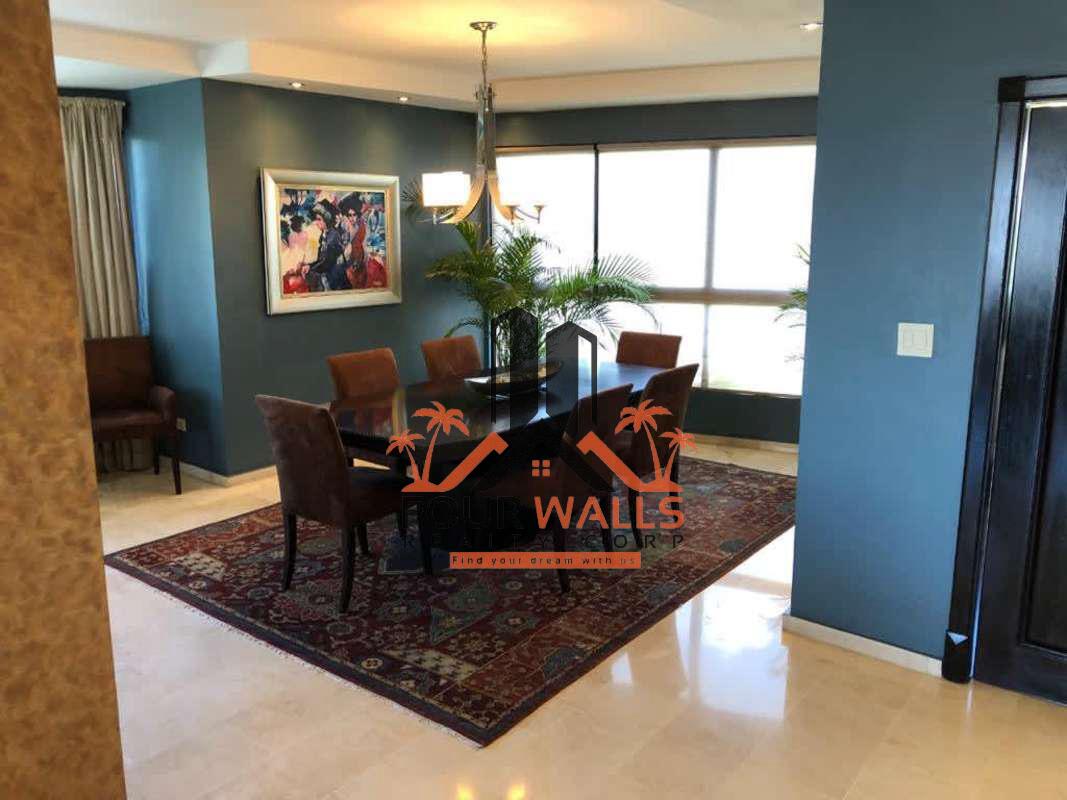 Spacious kitchen featuring dark granite countertops, large windows with city views in PH Elite La Cresta Panama