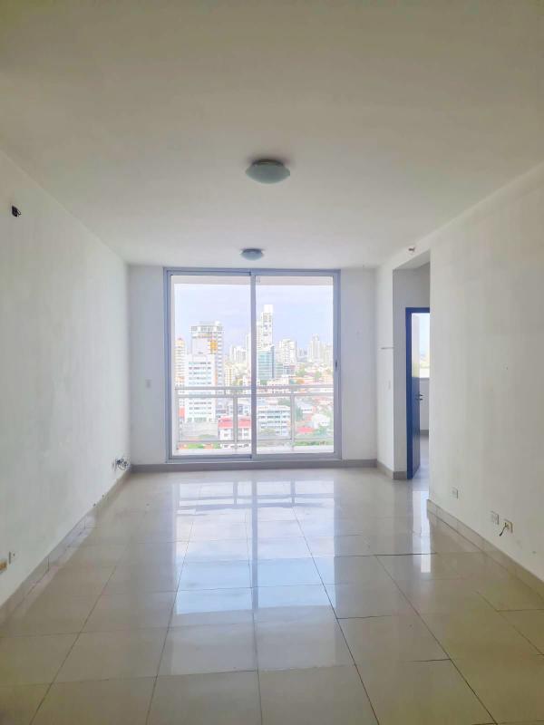 Spacious living room with large windows offering city views in apartment PH Latorraca Panama