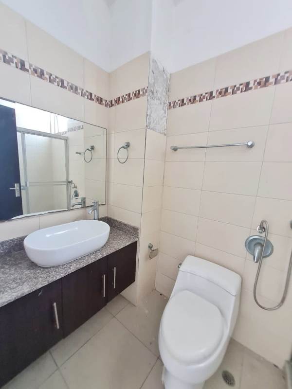 Bright bedroom with ceramic tile floors, built-in closets in PH Latorraca San Francisco Panama