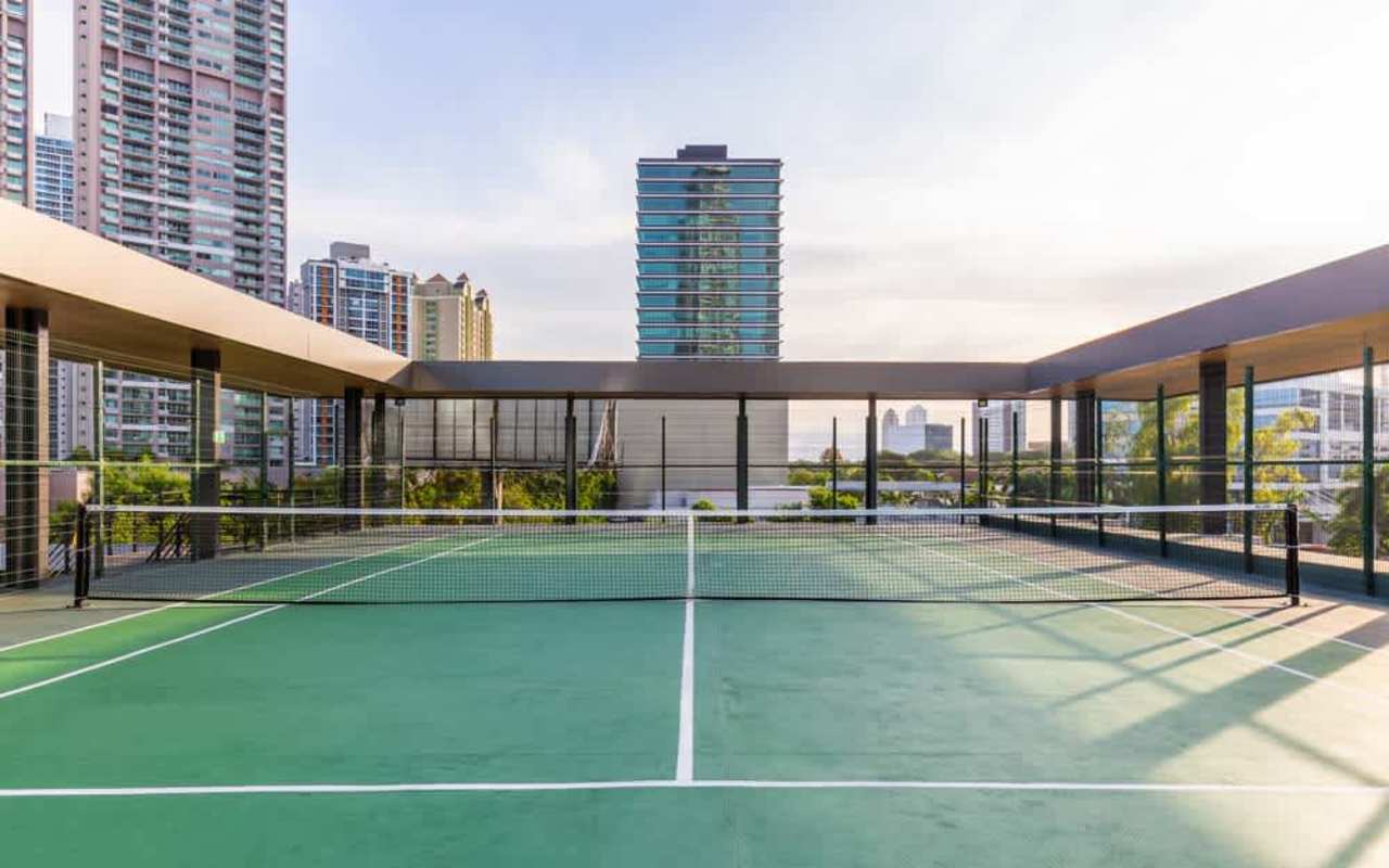 Contemporary granite kitchen with appliances and cabinetry in PH Garden Skyline Costa del Este Panama