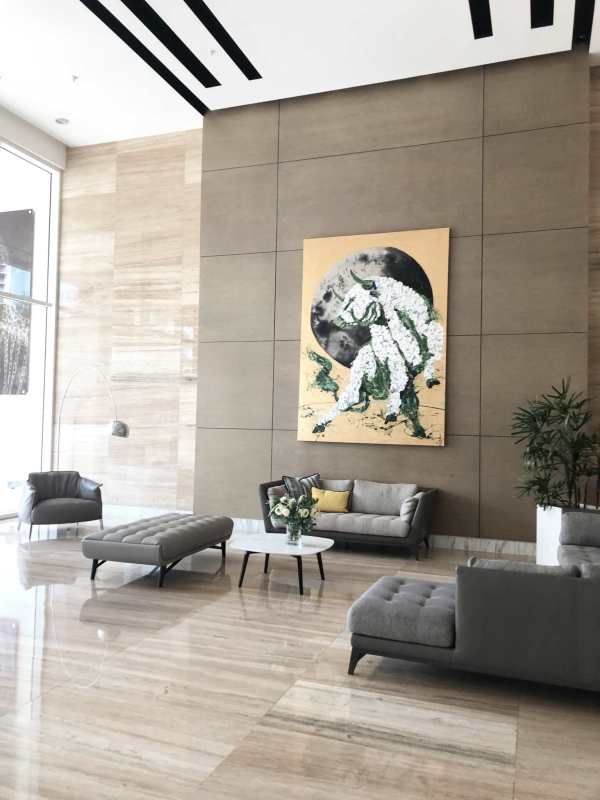 Luxury condo hallway glass partitions marble floor PH Santa María Costa del Este