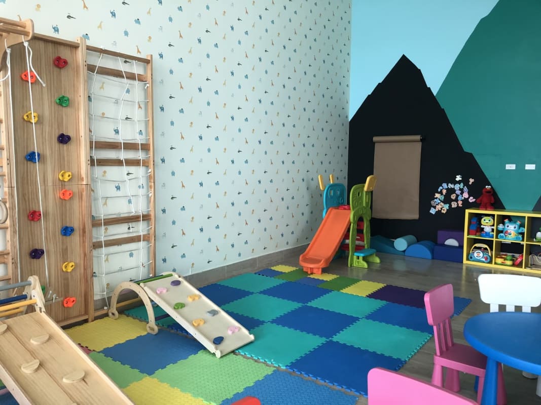 Colorful children play area with toys inside PH Santa María Costa del Este Panama