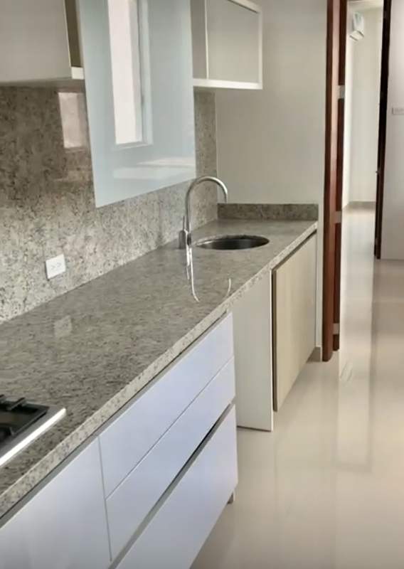 Spacious kitchen with granite countertops stainless steel appliances in PH Santa María Costa del Este Panama