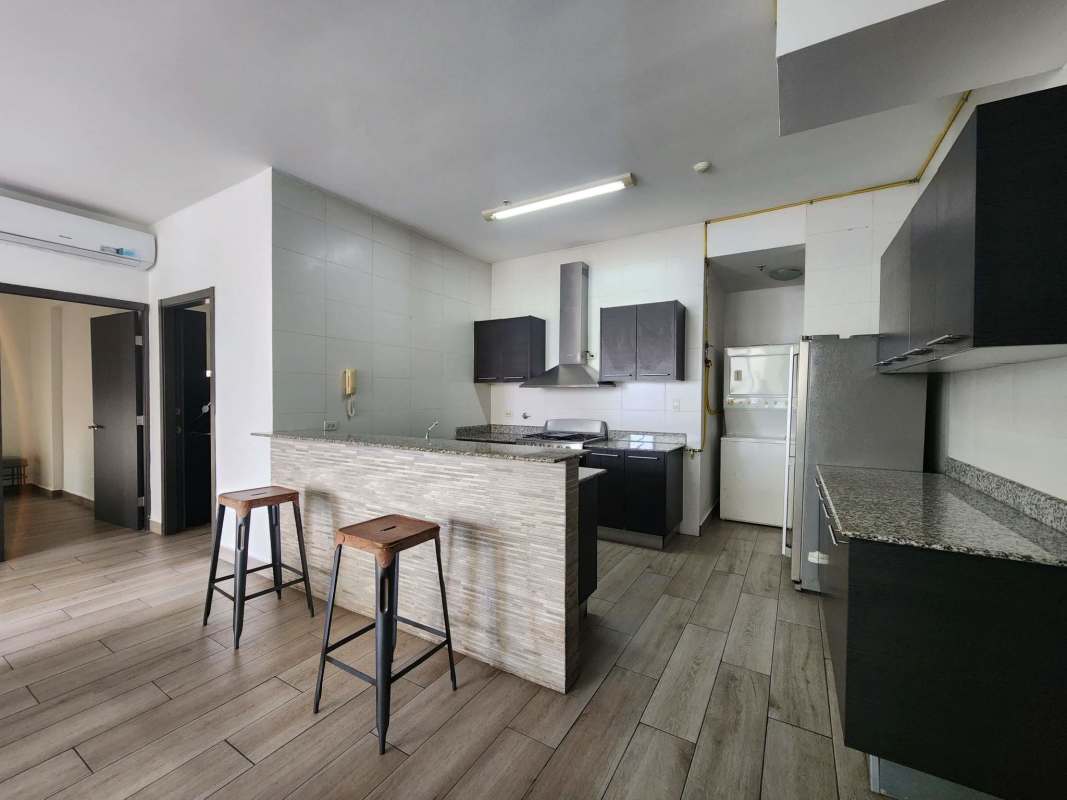 Comfortable bedroom with large window, closet and AC unit in PH Quadrat Panama City