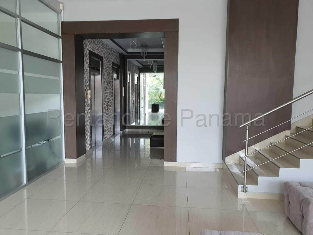 Open-plan living dining area with city view balcony in PH Diamond Tower San Francisco Panama
