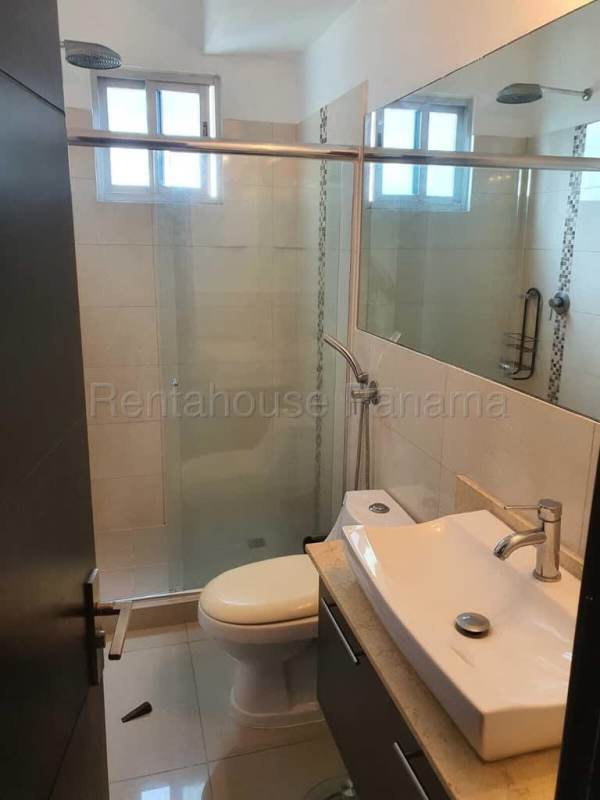 Modern bathroom equipped with glass shower and vanity in PH Diamond Tower Panama City