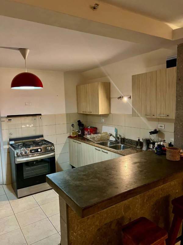 Second bedroom with built-in closet tile floors in PH Villa de las Fuentes Panama