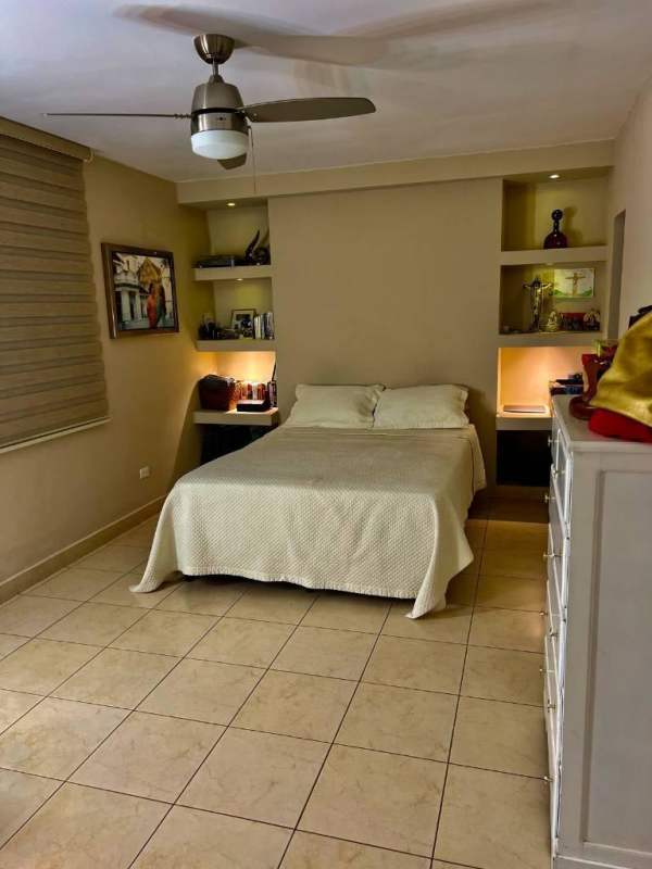 Modern bathroom with walk-in shower and vessel sink PH Villa de las Fuentes Panama