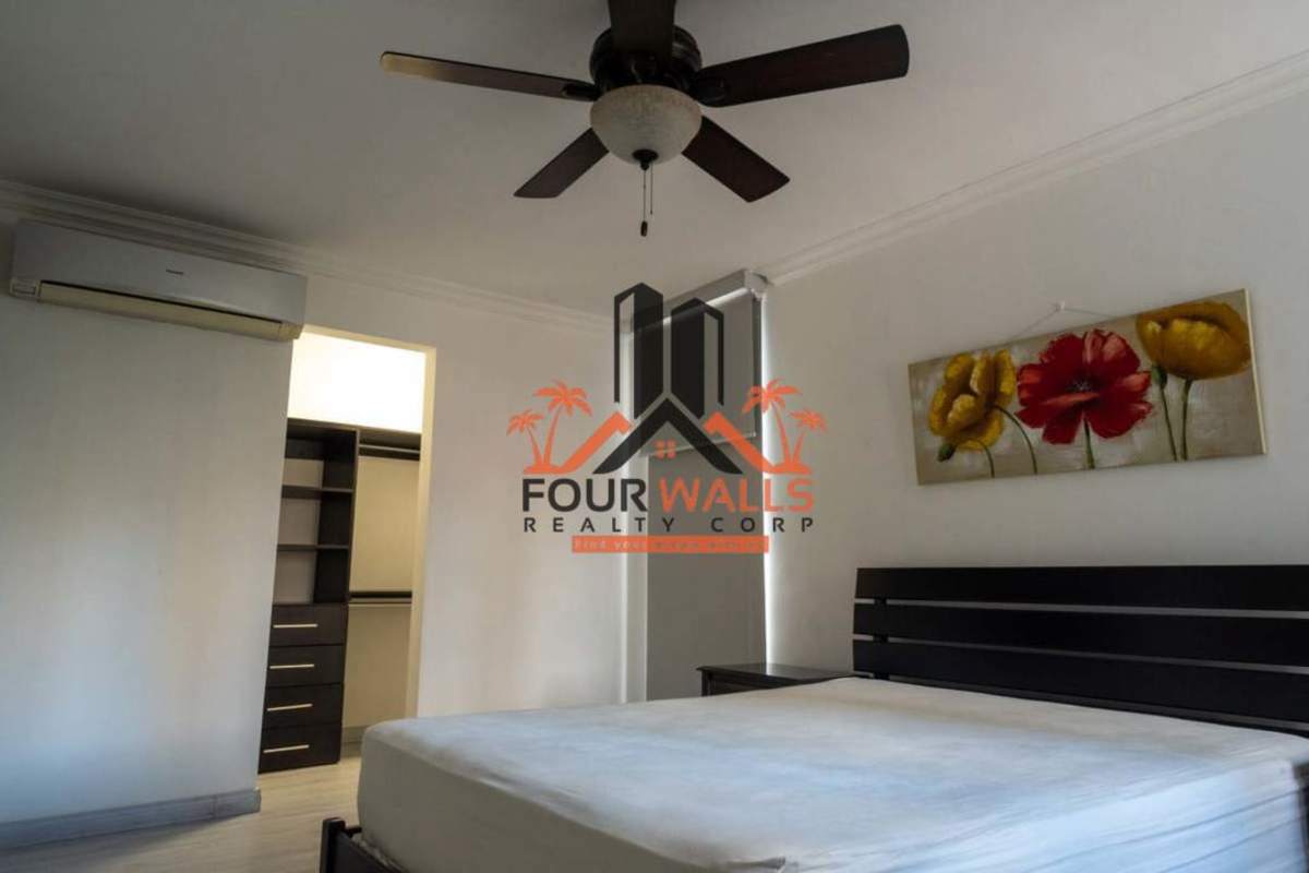 Main bedroom with built-in closet, air conditioning, ceiling fan at PH Blue Park apartment