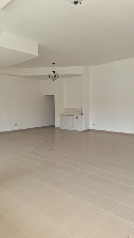 Modern commercial building facade PH Metro Park View with parking La Loceria Panama