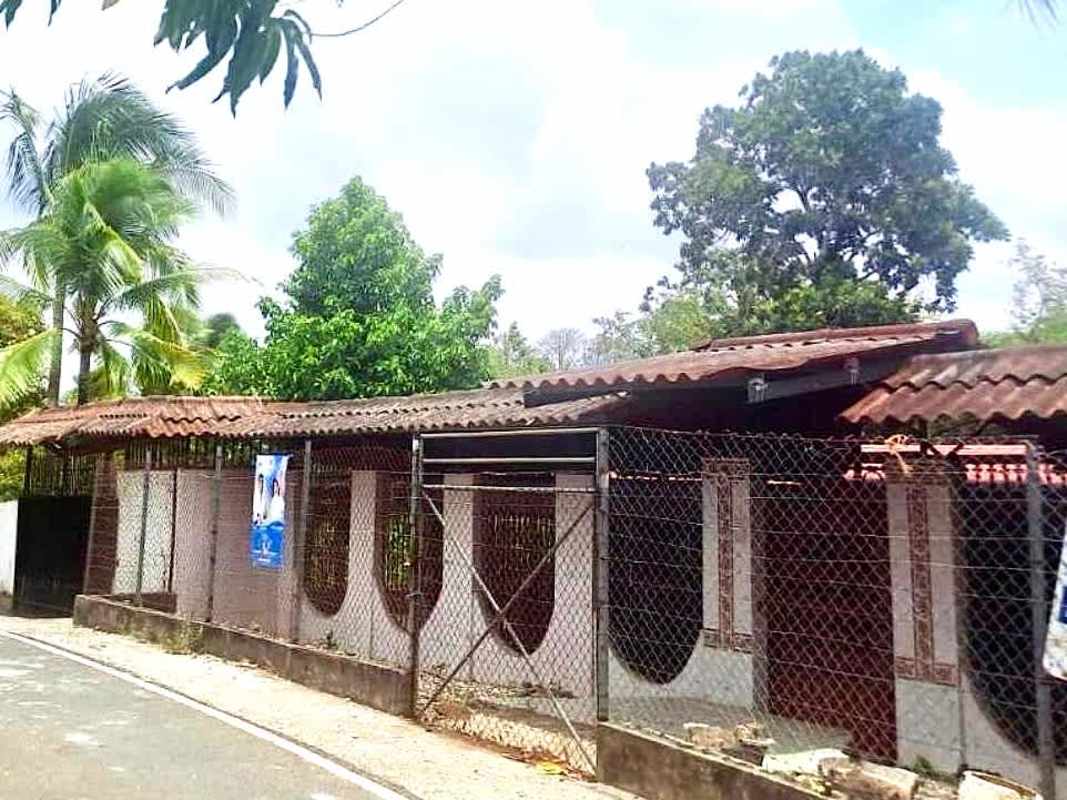 Covered gated front porch of traditional 5BR home in Chepo Panama