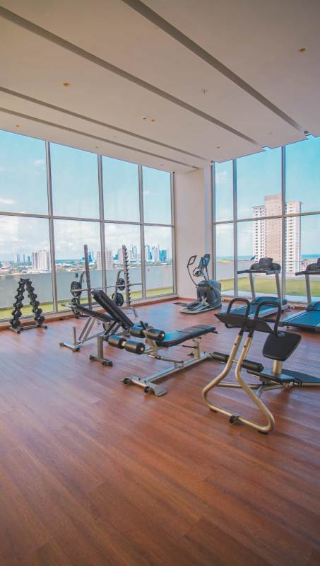 Rooftop playground with slides and skyline view at PH Miradores Residence Panama