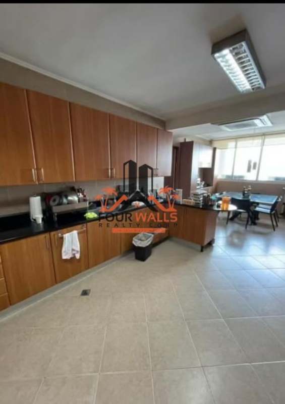 Gourmet kitchen with island, granite countertops at PH Peninsula Punta Paitilla Panama