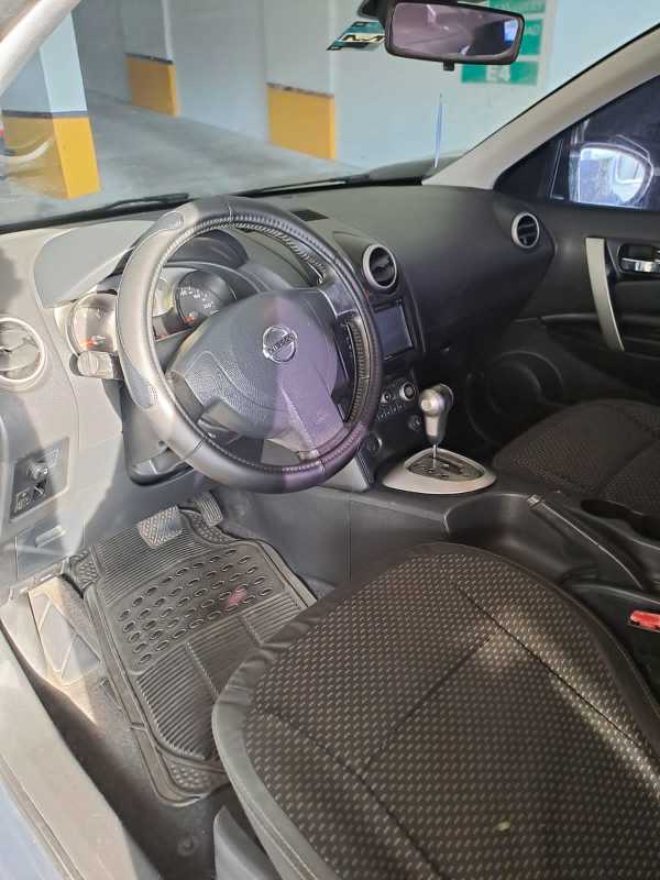 Secure indoor concrete garage with multiple parking stalls at El Dorado Business Plaza