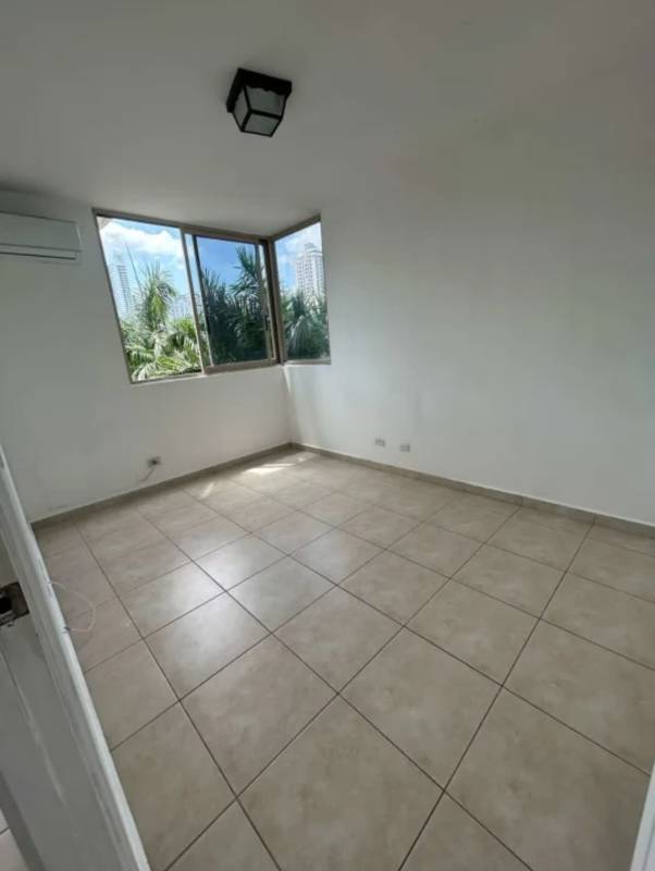 Bedroom with large windows built-in closets tiled flooring PH Coco del Mar Panama