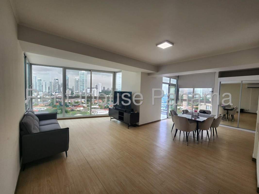 Modern living room with large windows city ocean views PH Moon Tower Coco del Mar Panama