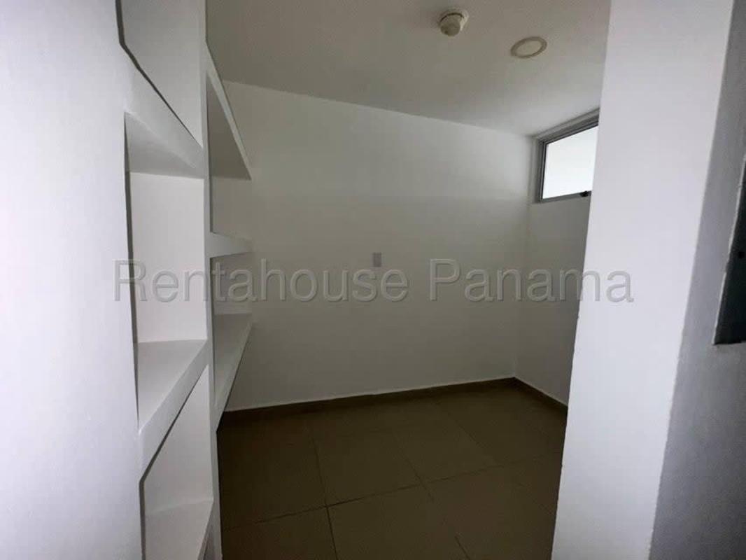 Spacious master bedroom with private balcony in modern house Costa Village Panama