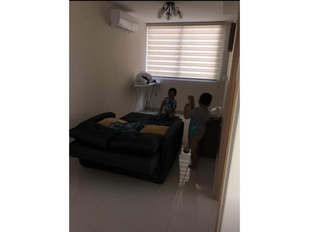 Cozy living space with AC, neutral decor and city backdrop PH Torre de Castilla Panama