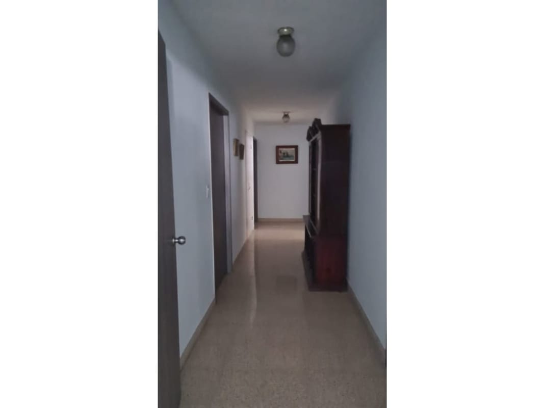 Long traditional hallway with tile floors PH Biarritz Obarrio Panama