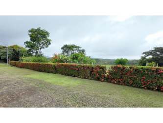 Interior view of open room with sleeping area kitchenette tile floor at Villas Capisucia San Carlos