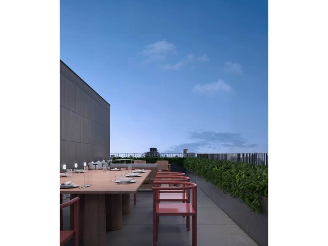 Panoramic rooftop terrace PH Kyte with city skyline, dining area and lounge Obarrio Panama
