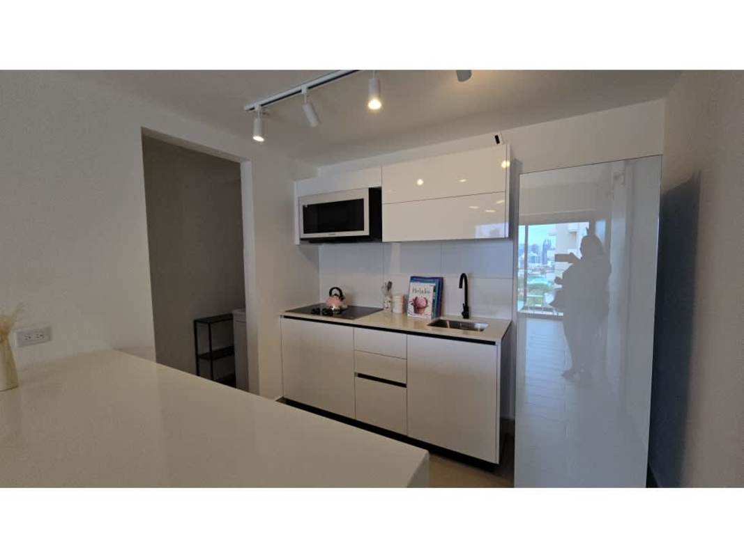 Be Living residential tower facade glass balconies commercial ground floor in Panama City