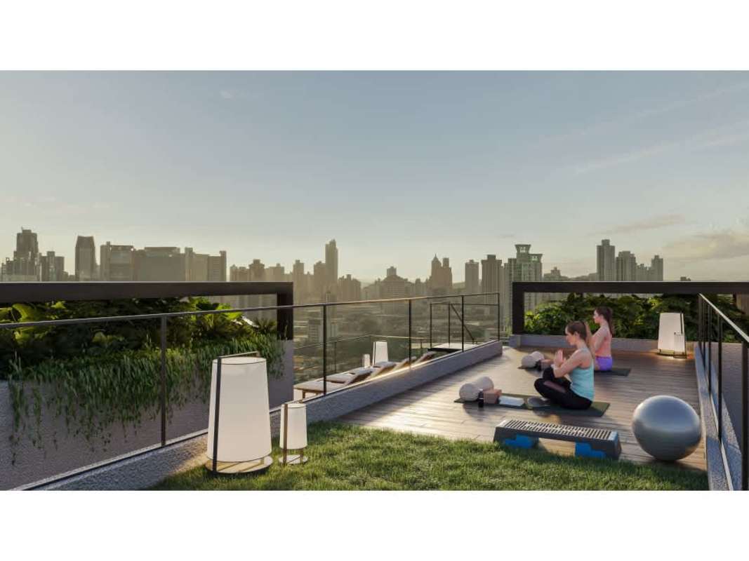Modern rooftop terrace with yoga area skyline backdrop at PH Be Living Panama City