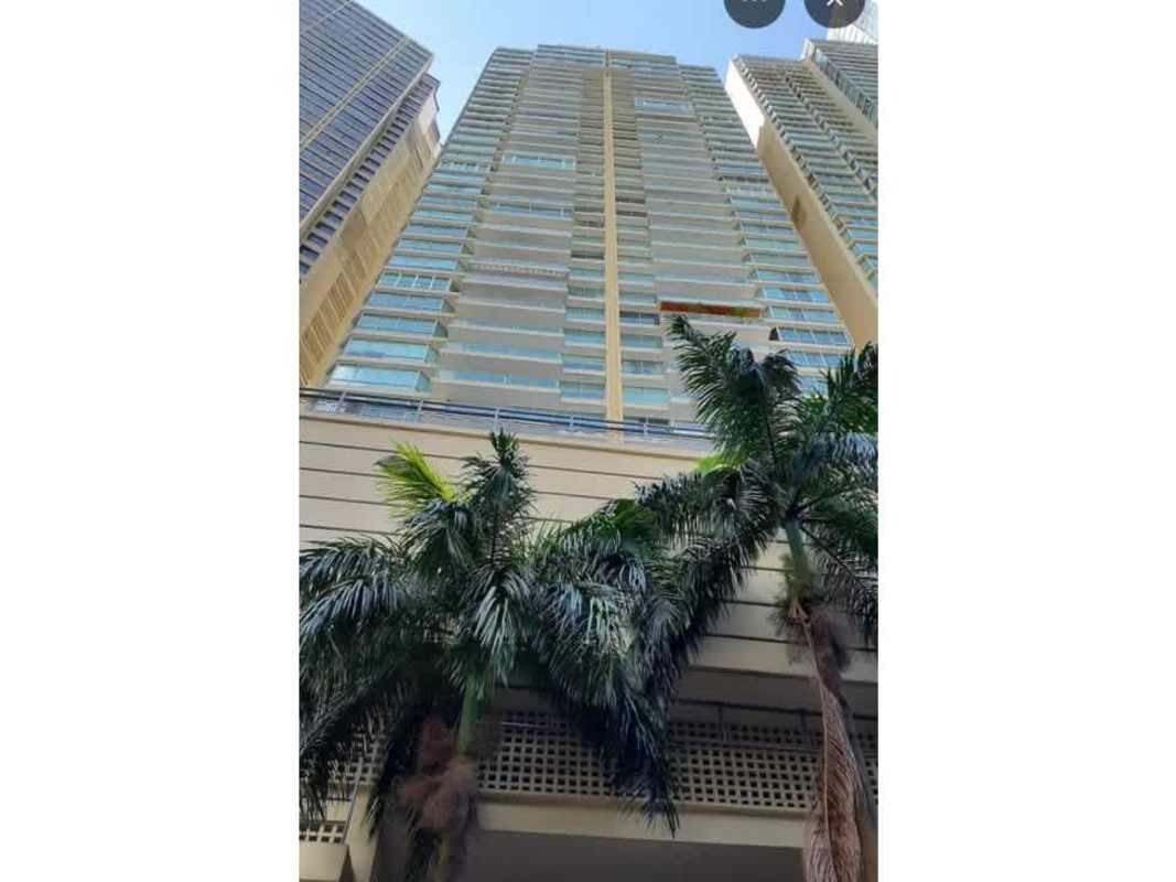 Modern living area with floor-to-ceiling windows and unobstructed ocean views at PH Peninsula Punta Paitilla Panama City