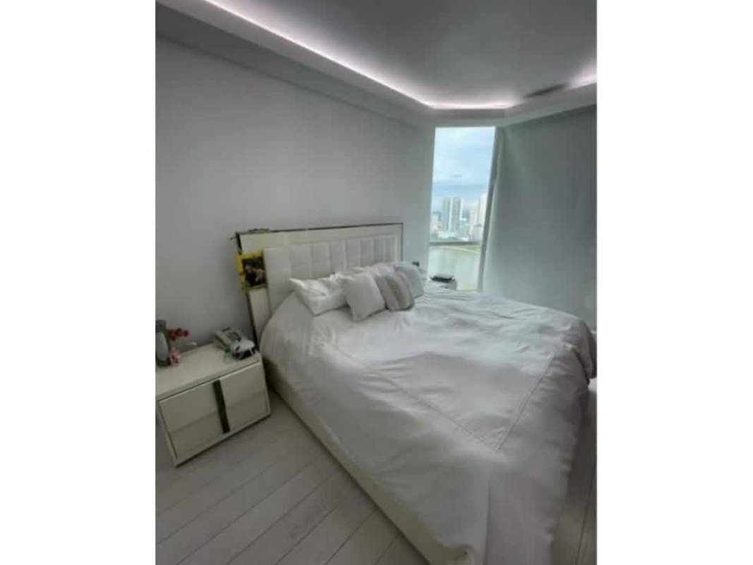 Elegant granite kitchen with wooden cabinets and stainless appliances in PH Peninsula Punta Paitilla Panama