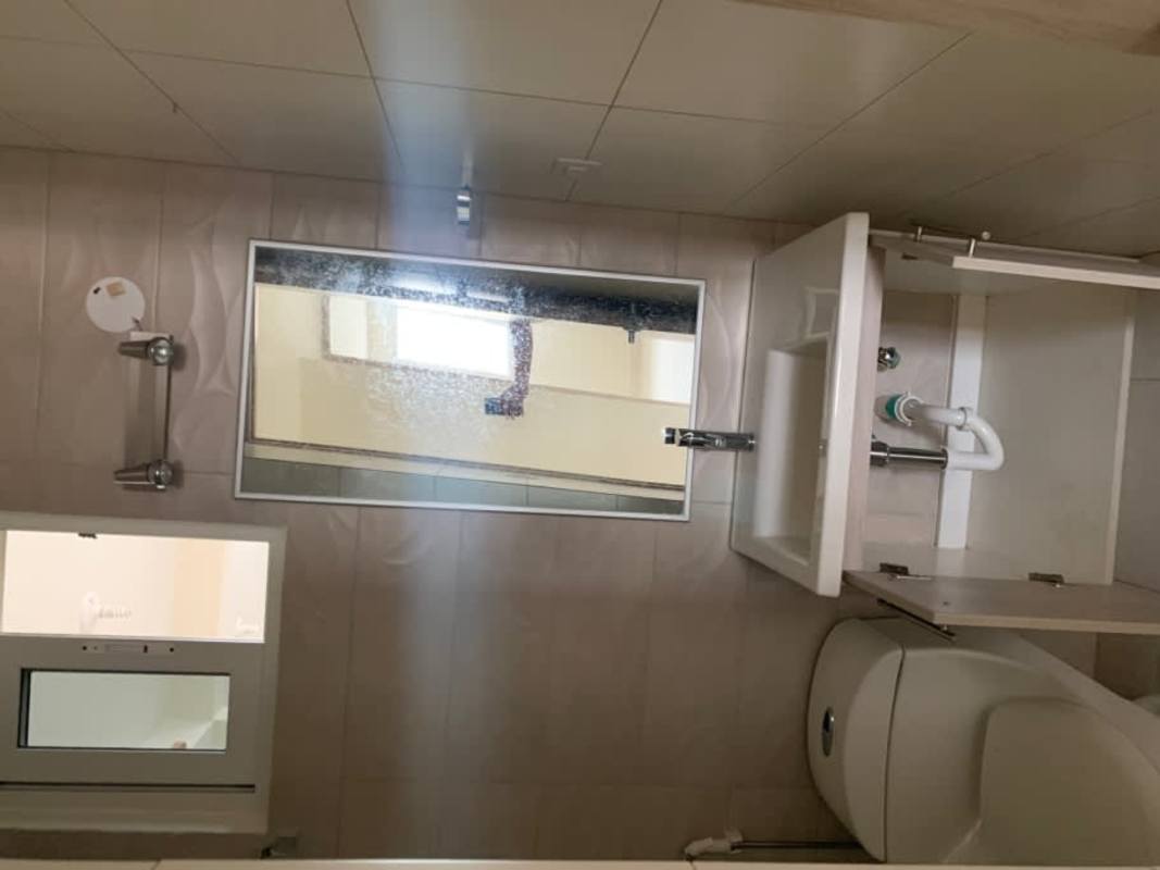 Modern bathroom with glass shower enclosure and vanity in PH Versalles Juan Díaz Panama