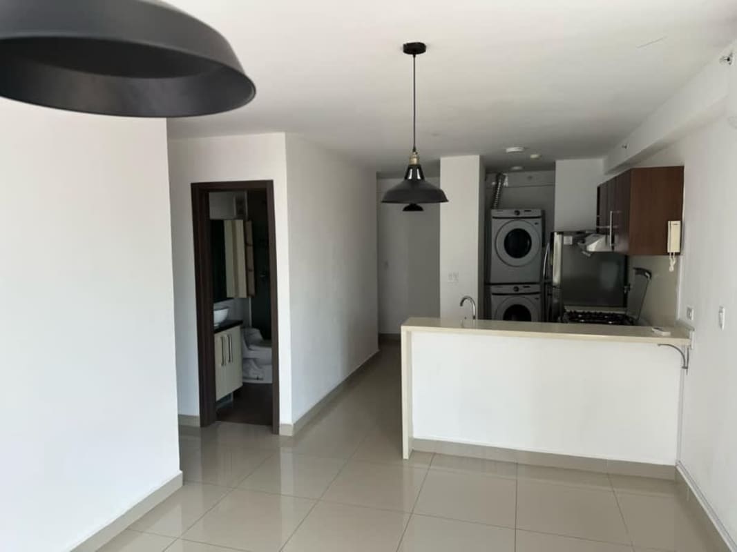 Bright living room with large windows and tile floors at PH Luma Tower Panama City