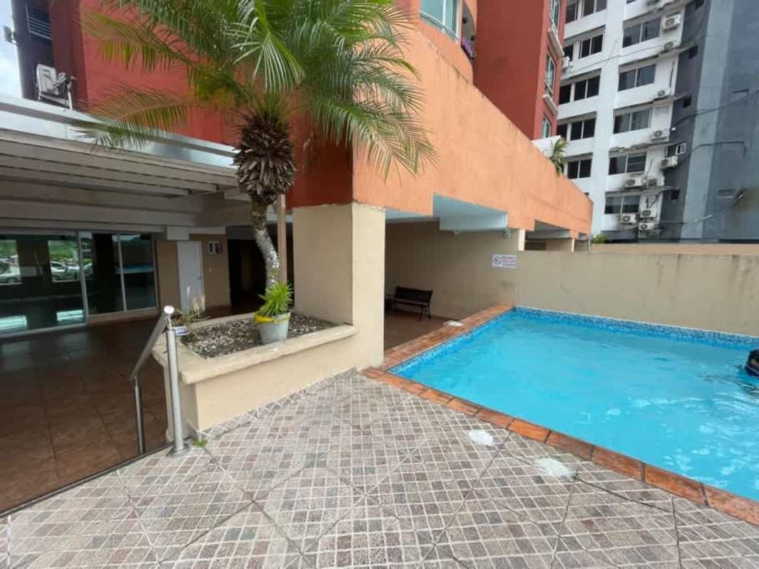 Swimming pool area with patio and garden at PH Royal Hills Tower II Villa de las Fuentes Panama