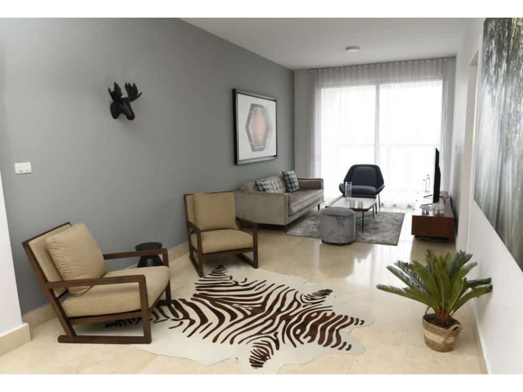 Modern living room with city views, stylish decor at Yoo Panama Avenida Balboa