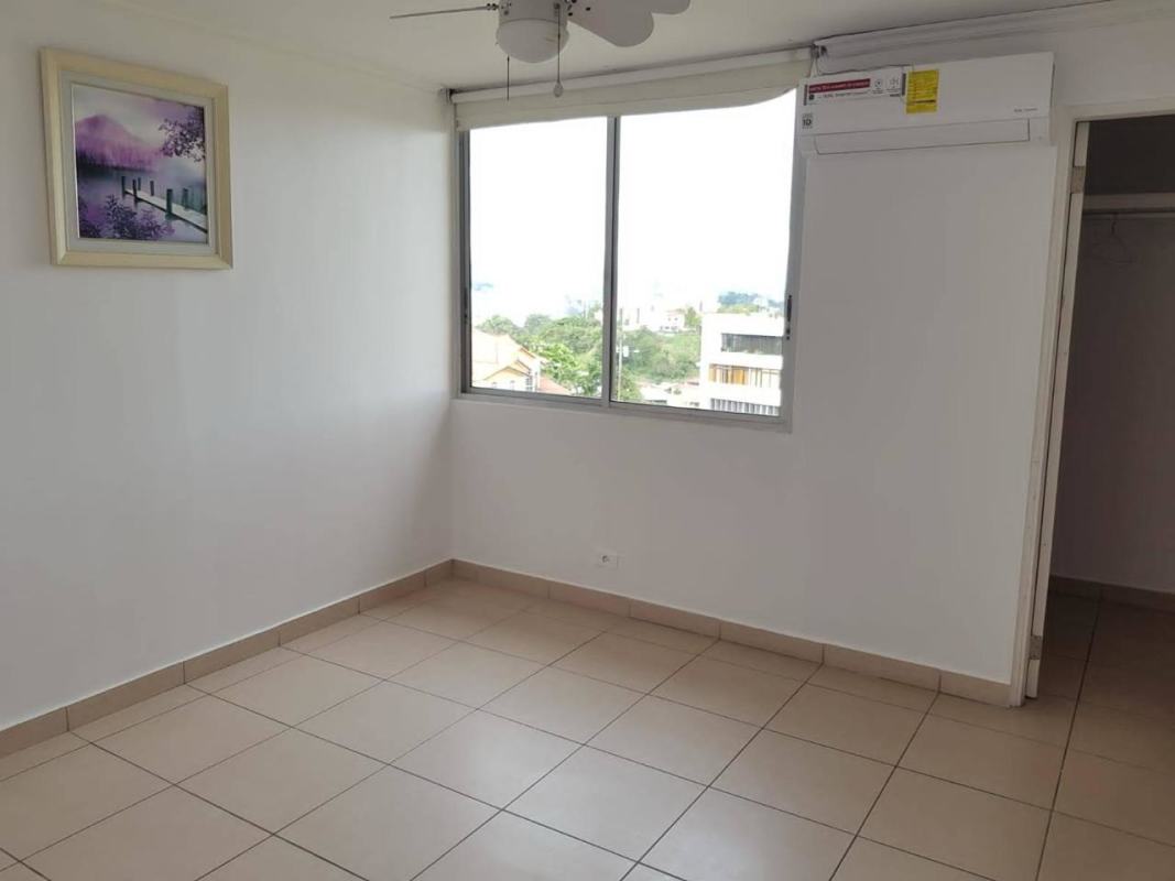 Lobby with sofa, art pieces, and air conditioning at PH Villa Nuova in El Dorado, Panama City
