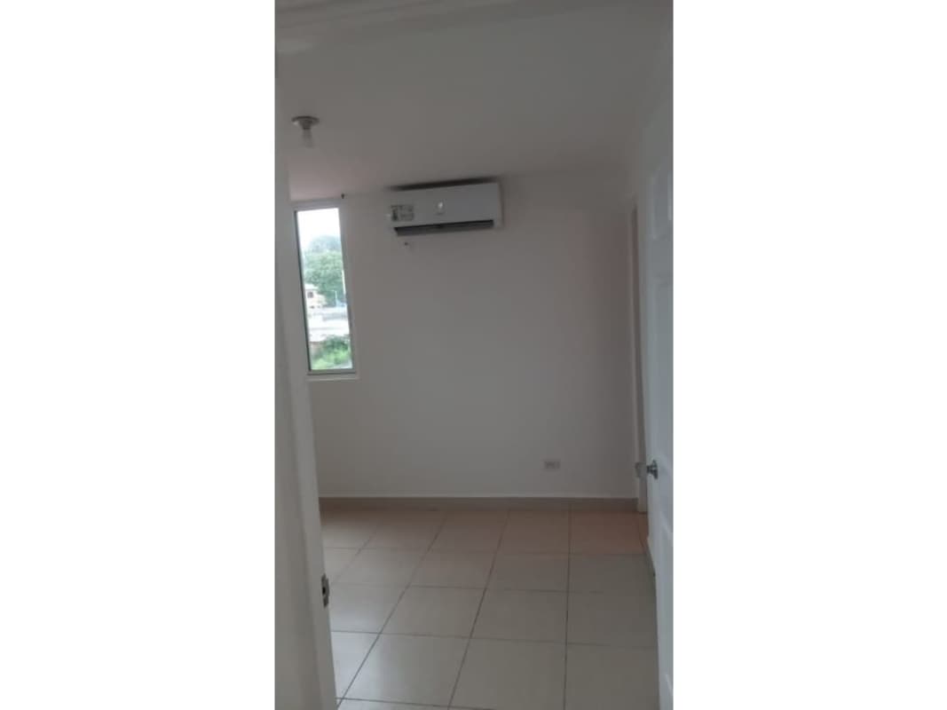 Empty minimalist bedroom tiled floor window AC unit Las Palmeras Rio Abajo